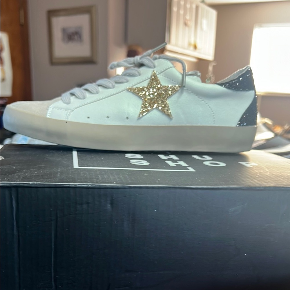 White Sneakers with Gold Star Accent